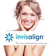 Woman smiling with Invisalign logo
