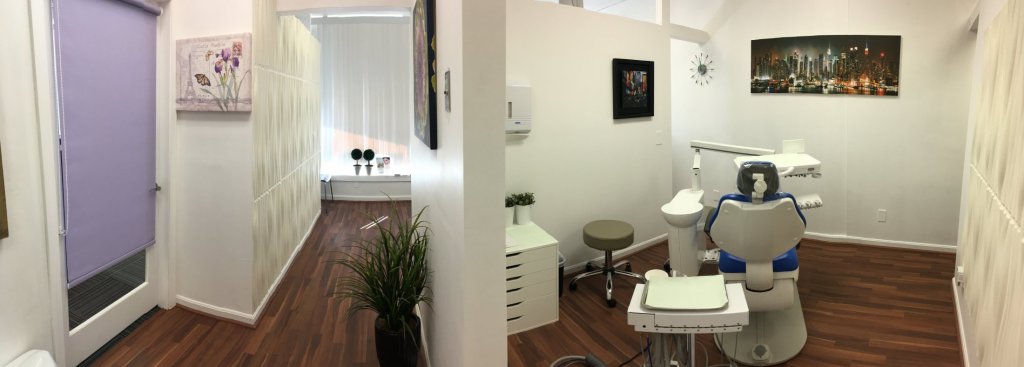 Hallway and patient room at {PRACTICE_NAME}